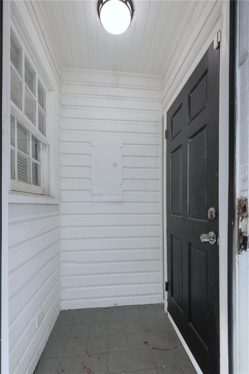 interior space with wooden walls