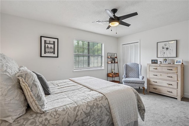 1771 Defoor Ave NW Unit D, Atlanta, GA 30318 - carpeted bedroom with a textured ceiling, a closet, and ceiling fan