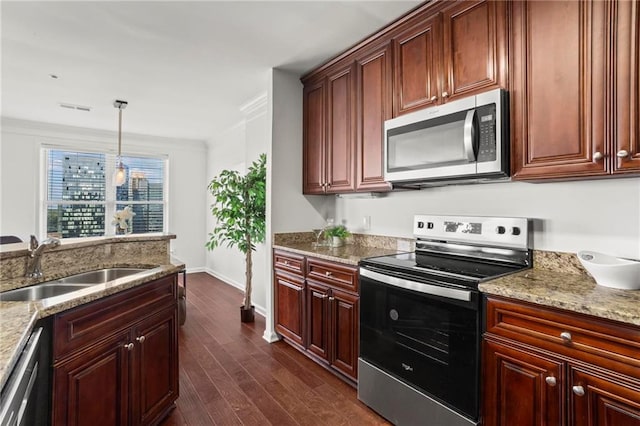 3334 Peachtree Rd NE Unit 1609, Atlanta, GA 30326 - kitchen with appliances with stainless steel finishes, a sink, dark wood-style floors, light stone countertops, and pendant lighting