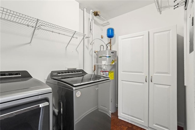 3334 Peachtree Rd NE Unit 1609, Atlanta, GA 30326 - washroom featuring cabinet space, washing machine and dryer, and electric water heater