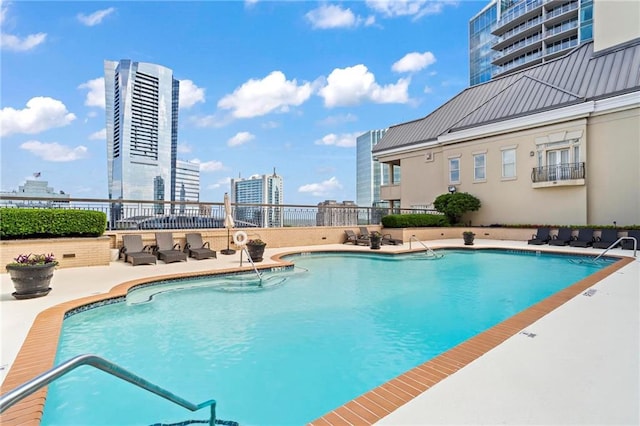 3334 Peachtree Rd NE Unit 1609, Atlanta, GA 30326 - community pool with a patio and a view of city