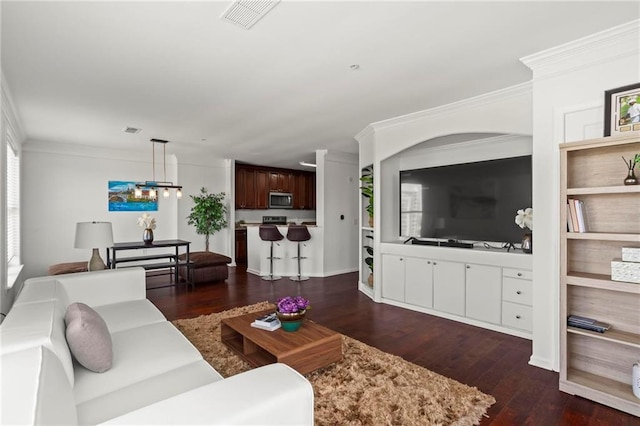 3334 Peachtree Rd NE Unit 1609, Atlanta, GA 30326 - living room with crown molding and dark wood-style floors