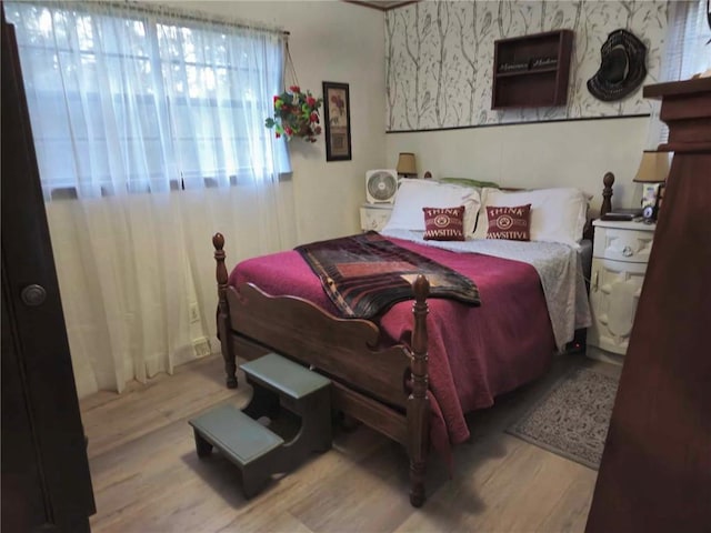 bedroom featuring hardwood / wood-style flooring