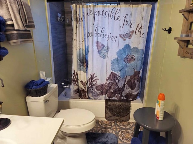 full bathroom with shower / bath combo, vanity, and toilet