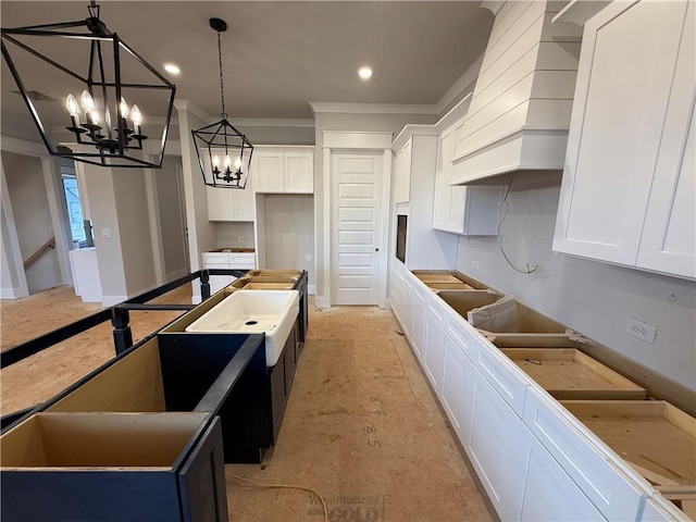 kitchen with recessed lighting, pendant lighting, and white cabinetry