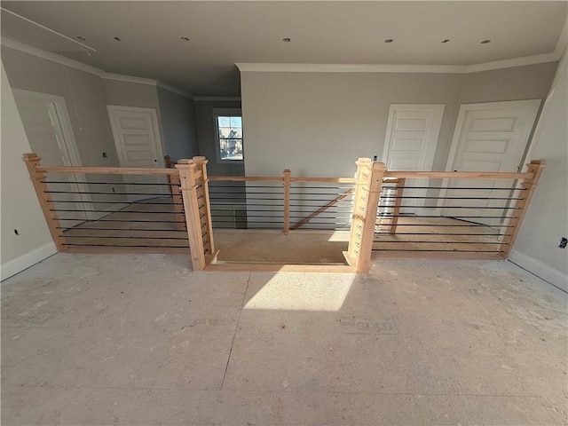 staircase featuring crown molding