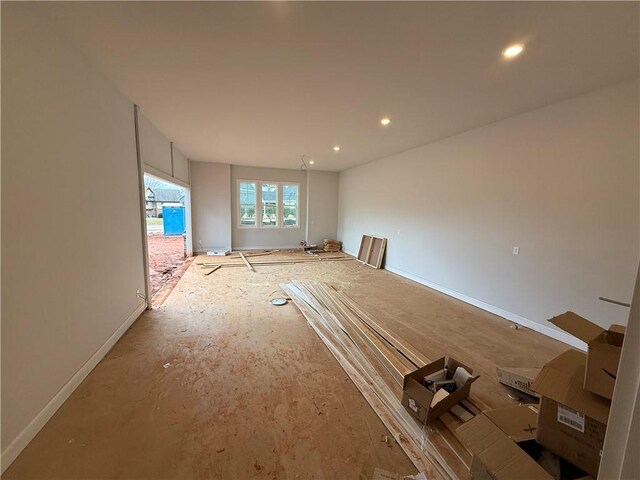 bathroom with ornamental molding and plenty of natural light