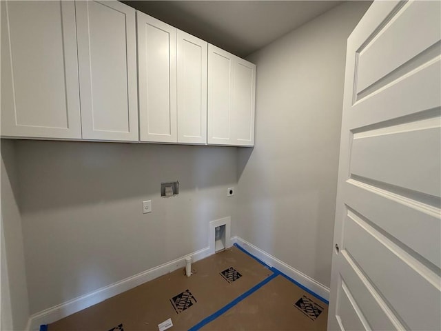 laundry room featuring baseboards, washer hookup, cabinet space, and electric dryer hookup