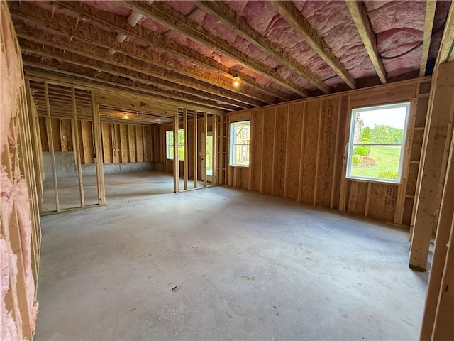 misc room featuring plenty of natural light and concrete floors