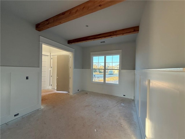 empty room with beam ceiling