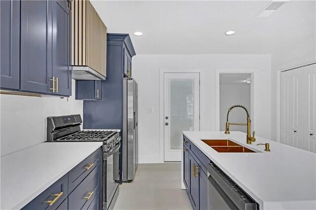 kitchen featuring blue cabinetry, sink, an island with sink, and black dishwasher