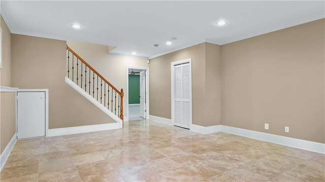 spare room with crown molding