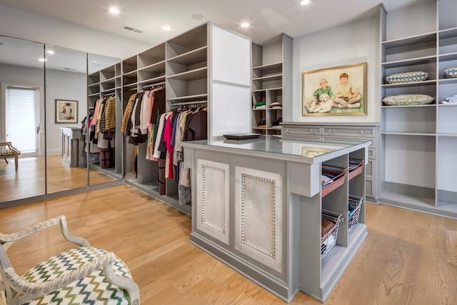 walk in closet featuring light wood-type flooring