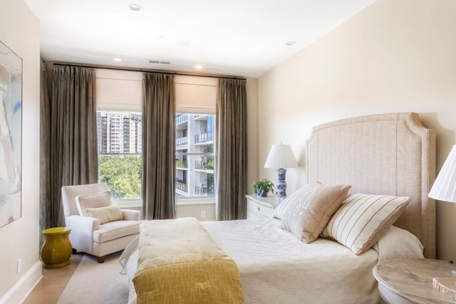 bedroom featuring light hardwood / wood-style floors