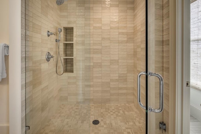 bathroom with an enclosed shower