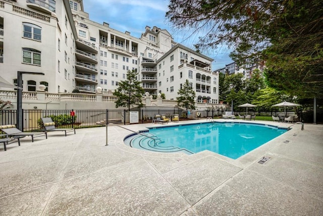 view of swimming pool featuring a patio