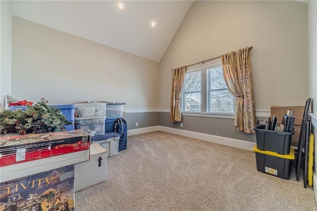 interior space with lofted ceiling and light colored carpet