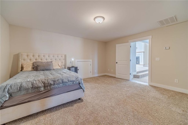 bedroom featuring carpet