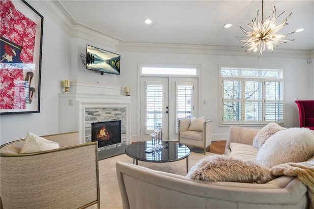 living room featuring a fireplace, a wealth of natural light, crown molding, and recessed lighting