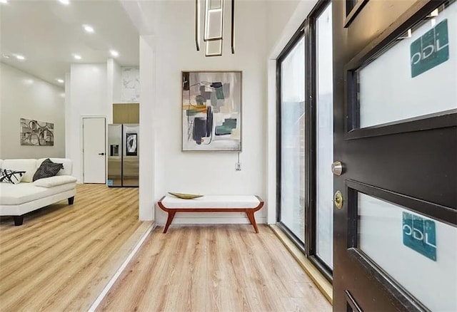 hallway with light wood-type flooring