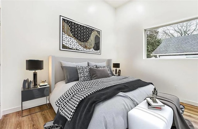 bedroom featuring hardwood / wood-style floors