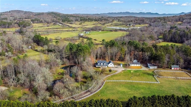 aerial view with a mountain view and a rural view