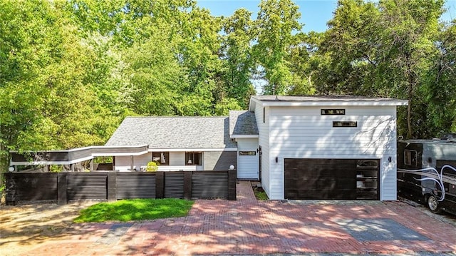 1048 Indian Hills Pkwy, Marietta, GA 30068 - view of front of home featuring a garage and decorative driveway