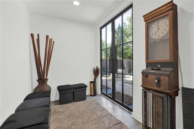 1048 Indian Hills Pkwy, Marietta, GA 30068 - living area with french doors, wood finished floors, baseboards, and recessed lighting