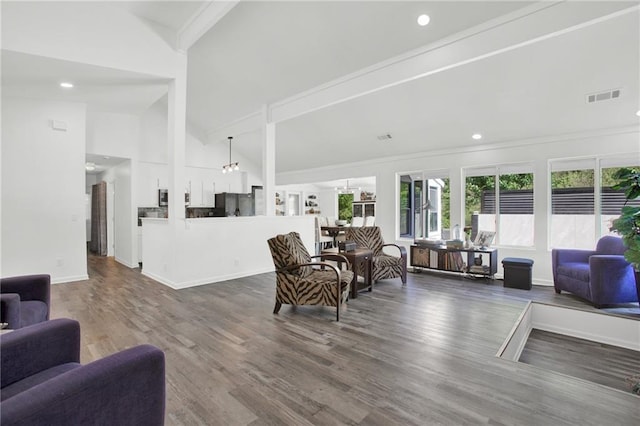 1048 Indian Hills Pkwy, Marietta, GA 30068 - living area featuring wood finished floors, high vaulted ceiling, recessed lighting, and baseboards