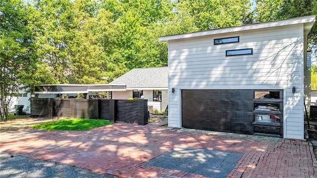 1048 Indian Hills Pkwy, Marietta, GA 30068 - view of front of home with decorative driveway and a garage