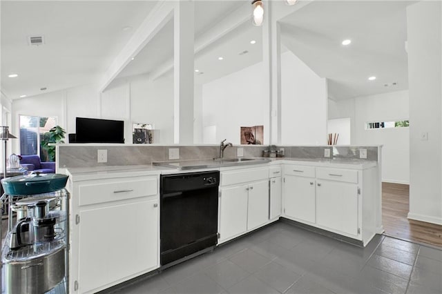 1048 Indian Hills Pkwy, Marietta, GA 30068 - kitchen with dishwasher, lofted ceiling, a peninsula, open floor plan, and light countertops