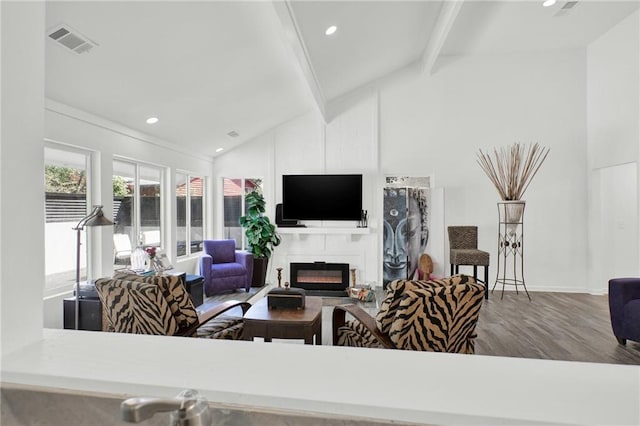 1048 Indian Hills Pkwy, Marietta, GA 30068 - living area featuring beamed ceiling, a large fireplace, wood finished floors, recessed lighting, and high vaulted ceiling