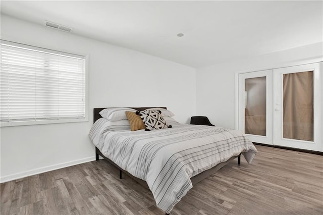 1048 Indian Hills Pkwy, Marietta, GA 30068 - bedroom featuring wood finished floors and baseboards