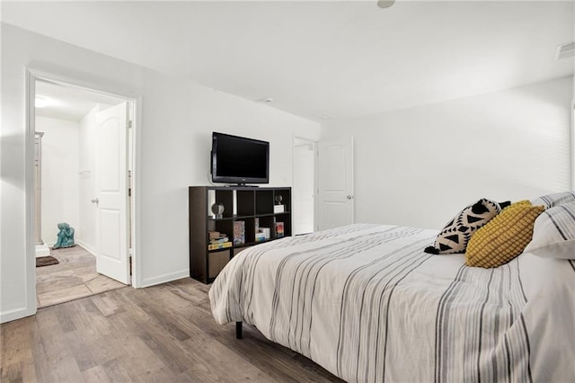 1048 Indian Hills Pkwy, Marietta, GA 30068 - bedroom with wood finished floors and baseboards