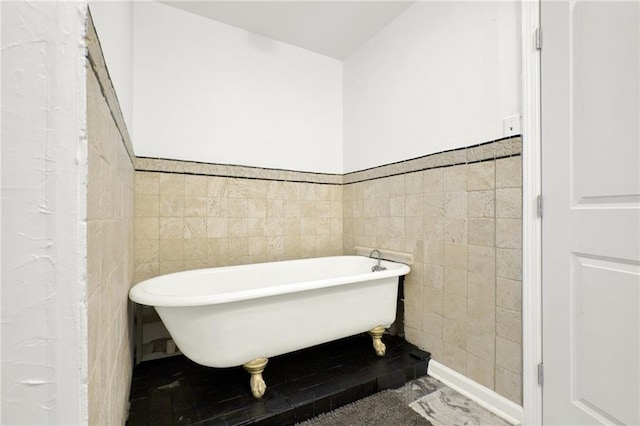 1048 Indian Hills Pkwy, Marietta, GA 30068 - full bathroom featuring tile walls, a soaking tub, and wainscoting