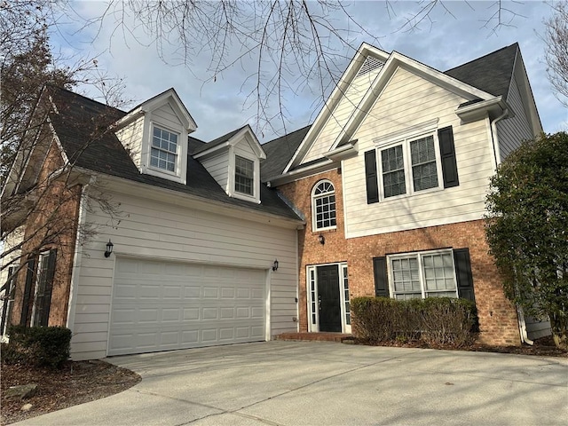 view of front of property featuring a garage