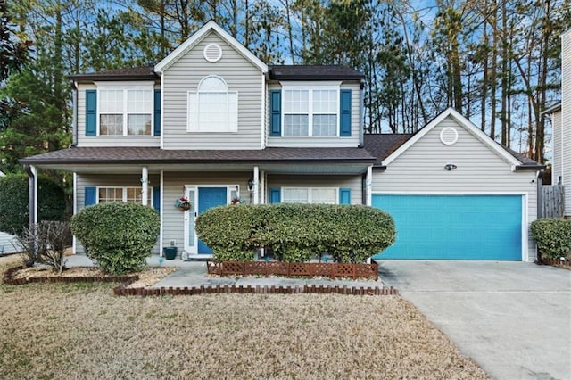 front of property featuring a garage and a front yard