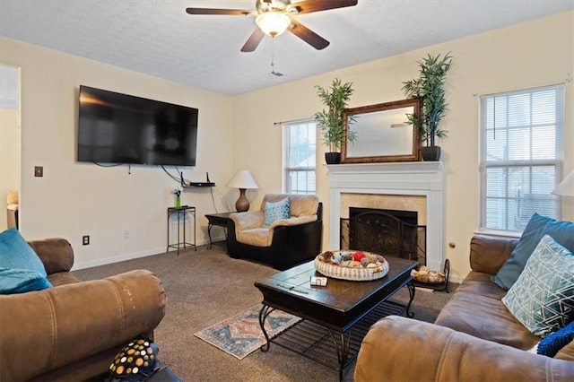 living room featuring carpet flooring and ceiling fan