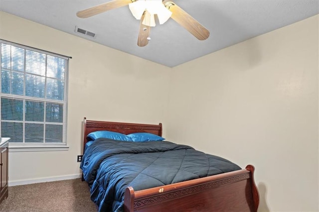 bedroom featuring ceiling fan and carpet floors