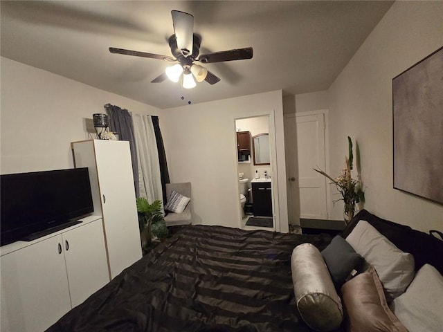 bedroom with ceiling fan and ensuite bathroom