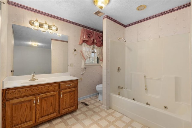 full bathroom with ornamental molding, vanity, a textured ceiling, shower / tub combination, and toilet