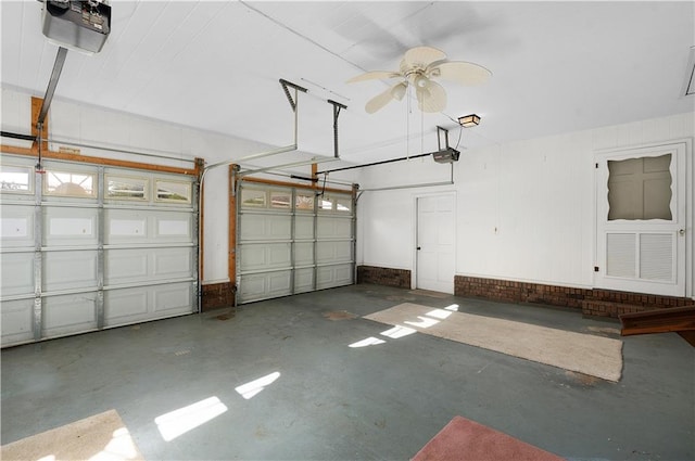 garage featuring ceiling fan and a garage door opener