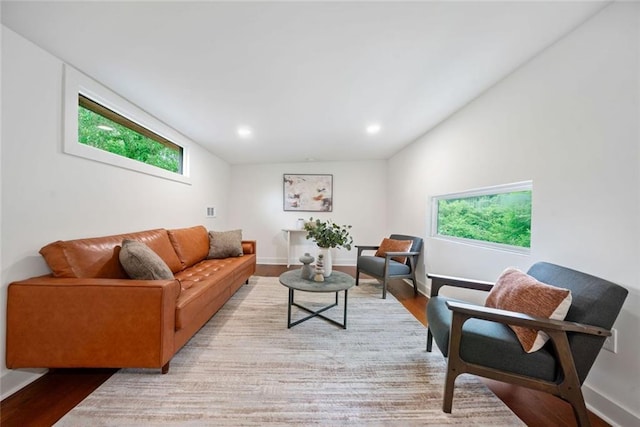 2822 Waters Rd SW, Atlanta, GA 30354 - living room with wood finished floors, recessed lighting, baseboards, and vaulted ceiling