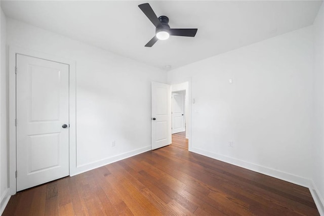 2822 Waters Rd SW, Atlanta, GA 30354 - unfurnished bedroom featuring baseboards, wood finished floors, and ceiling fan