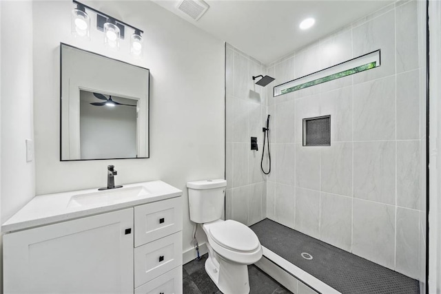2822 Waters Rd SW, Atlanta, GA 30354 - bathroom featuring tiled shower, toilet, and vanity