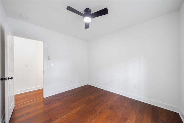 2822 Waters Rd SW, Atlanta, GA 30354 - spare room featuring hardwood / wood-style floors, baseboards, a ceiling fan, and a smoke detector