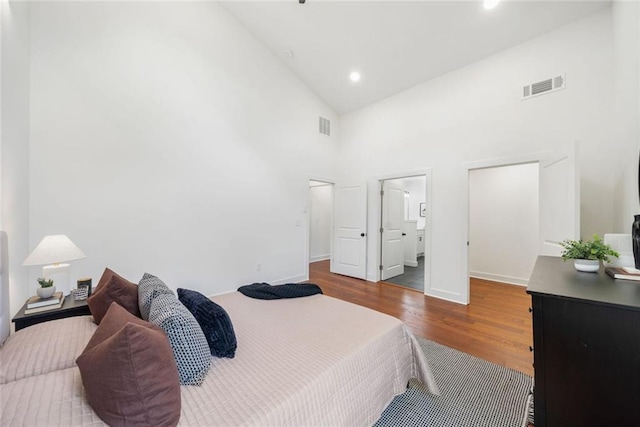 2822 Waters Rd SW, Atlanta, GA 30354 - bedroom with high vaulted ceiling, wood finished floors, recessed lighting, and baseboards