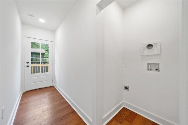 2822 Waters Rd SW, Atlanta, GA 30354 - laundry area with hookup for an electric dryer, washer hookup, dark wood finished floors, and baseboards