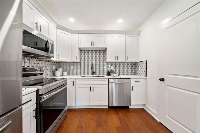 2822 Waters Rd SW, Atlanta, GA 30354 - kitchen with stainless steel appliances, a sink, light countertops, and recessed lighting