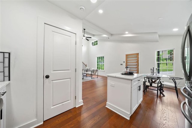 2822 Waters Rd SW, Atlanta, GA 30354 - kitchen featuring ceiling fan, recessed lighting, dark wood finished floors, freestanding refrigerator, and white cabinetry
